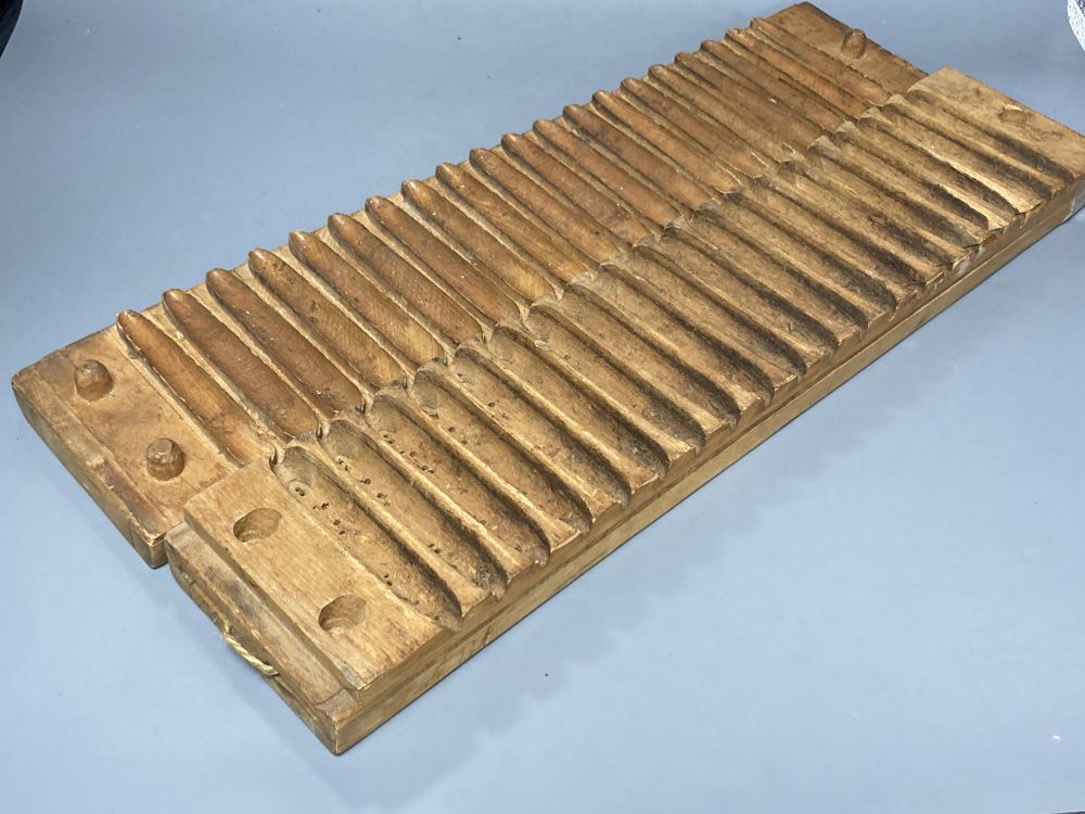 Two cigar moulds, 56cm